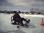 Tina clearing the Mayfair Park rink using Bob Bechey's racer snowplow
